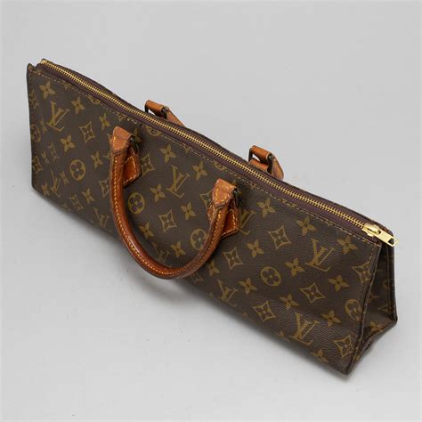 louis vuitton triangle bag